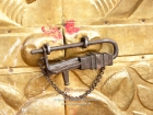 Nepal, Western Region, Lumbini Zone, Palpa District, Tansen: Detail of the "golden" gate of the Bhagawati-Mandir. Built in the 19th century for remembering the victorious battle near Butwal against the British and Indian troops. Three other temples, dedicated to Shiva, Ganesh and Saraswati (Goddes of education), can be found on this compound