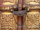 Nepal, Central Region, Bagmati Zone, Bhaktapur District: Changu Narayan Temple; Door covered with brass and two Talsa (here the center one) at the westside opposite the Vishnu-Garuda temple at the Narayan-Temple, see also photos L1040511 to L1040 517
