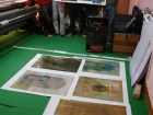 India, Kashmir, Srinagar, Khoj International Artists Workshop 2007: Printing the works of photography  by H.Grammatikopoulos  with works of Tooraj Khamenehzadeh, Iran in the foreground