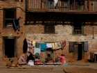 Nepal, Central Region, Bagmati Zone, Kirtipur: Chating in the wintersun on the streets between the two hills of the town