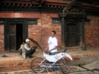 Nepal, Central Region, Bagmati Zone, Lalitpur, Patan, Sutra International Workshop at Patan Durbar Mul Chowk: Masum Chisty from Bangladesh preparing his mobile installation, the old man sitting next to him is one of the priests of Mul Chowk