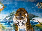 Tibet, Gyantse, Baiju Monastery (Pelkor ChÃ¶de), the Kumbum Stupa: Fresco with a funny tiger in the entrance gate