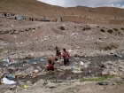 Tibet, Purang, Darchen (4620m), Kailash Kora: A glimbse of the village center, surching in the waste, awerelessly thrown into the river by the village people