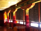 Tibet, Lhasa, Potala Palace: The gallery on the second floor in the Red Palace; on the left are the doors to the treasures of the Potala exhibition, to the Chapel s of the 9 Buddhas of Longevity and to Sakyamuni (Thuburang Lhakhang) (LP12,13,14 p.100)