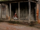 Nepal, Central Region, Bagmati Zone, Bhaktapur District, Bhaktapur, Talako (Pottery Square): Old man smoking a traditional 'Hooka'